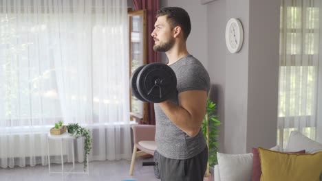 Athlete-young-man-exercising-at-home.